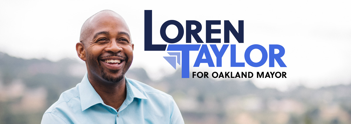 Loren Taylor smiling with Oakland Hills in the background and his logo that says "Loren Taylor for Oakland Mayor"